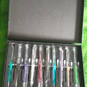 10 x glitter top propelling pen boxed set with spare refills box has storage marks